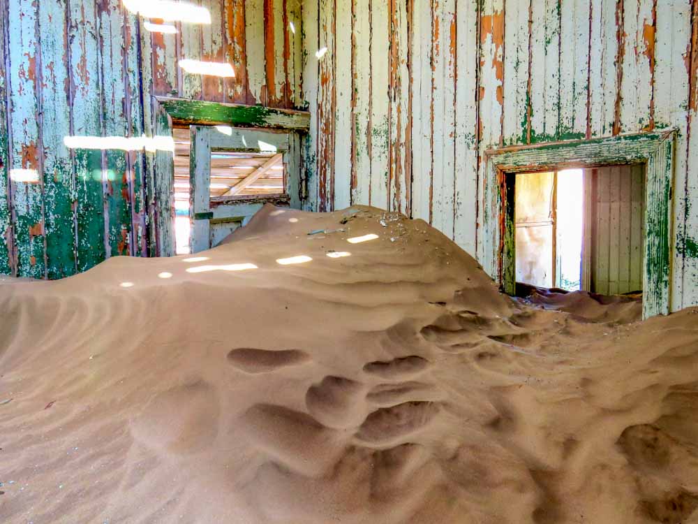 desert filled room Kolmanskop namibia