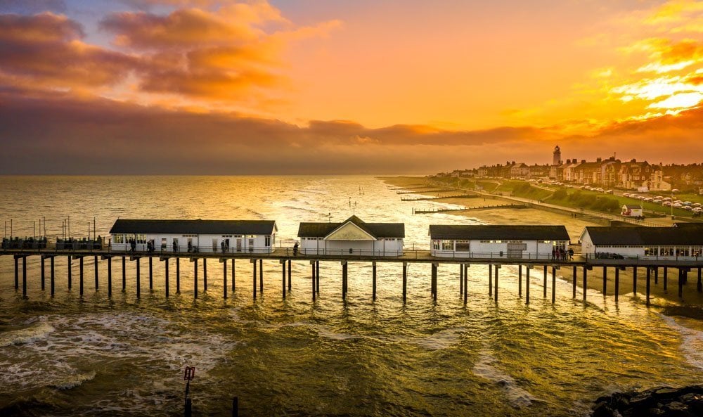 southwold pier and the town at sunset