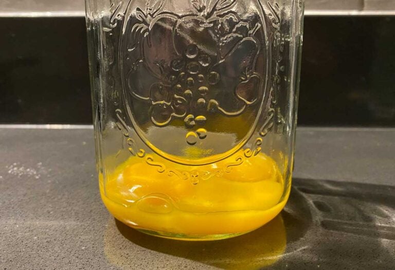 egg yolk and lemon juice in container