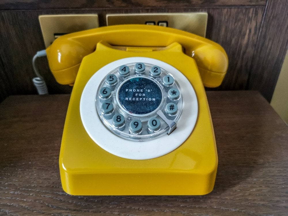 old fashioned yellow room telephone