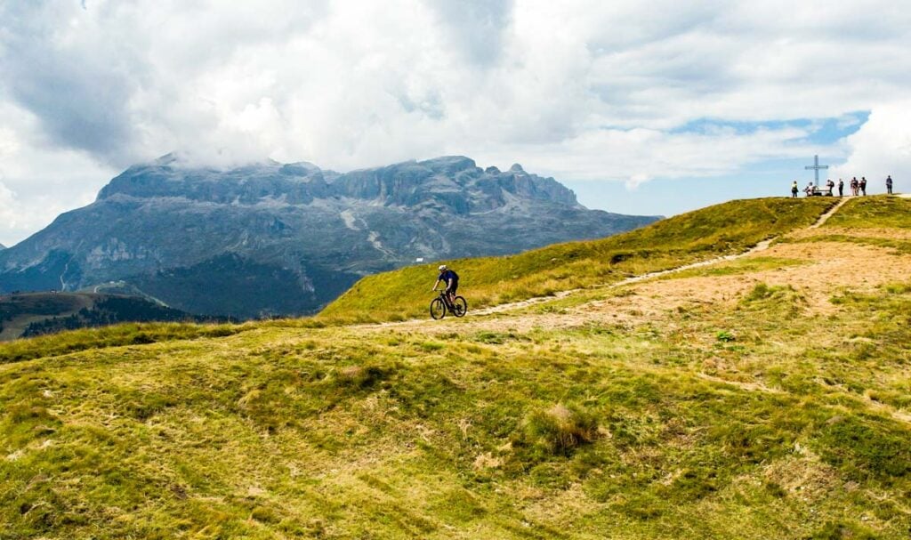 Mountain Biking on Piz Sorega with the Sella behind