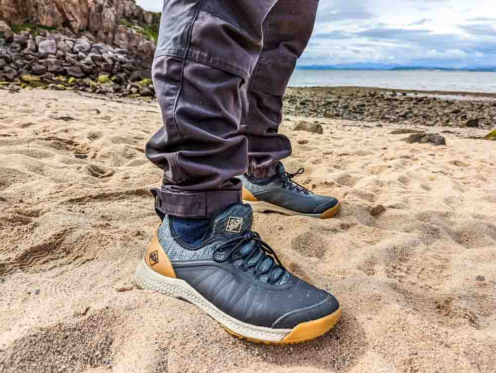 muck boots on the beach