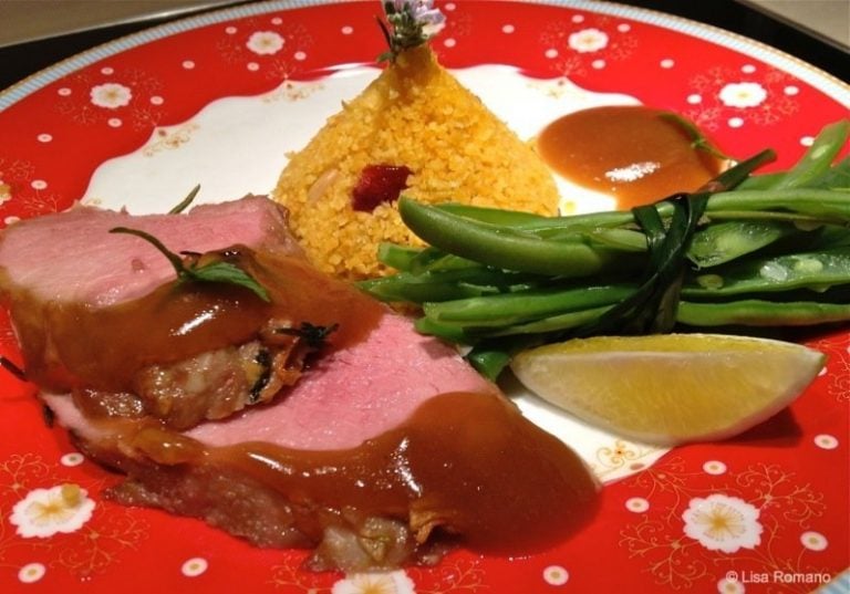 Spiced pork fillet with corn couscous and beans