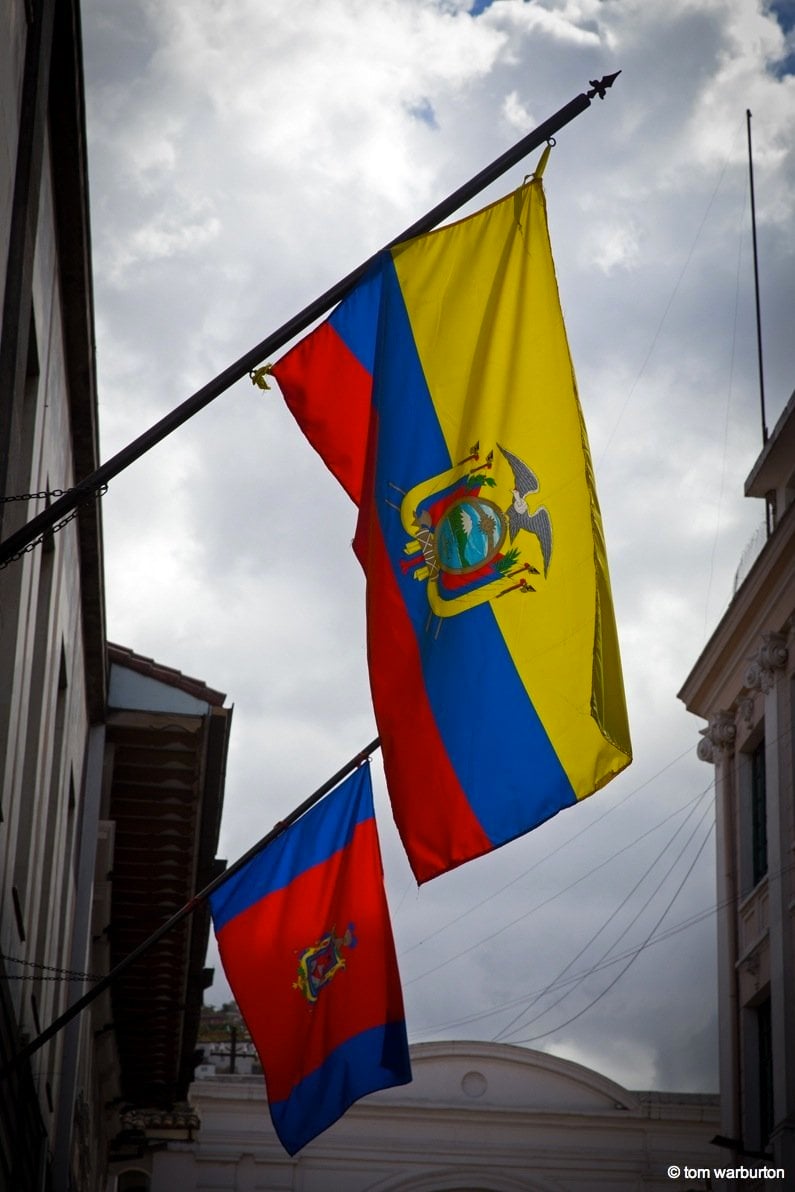 Flag of Ecuador flying beside the Flag of Quito 