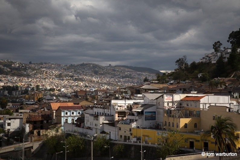 houses on steep hills and expanse of Quito