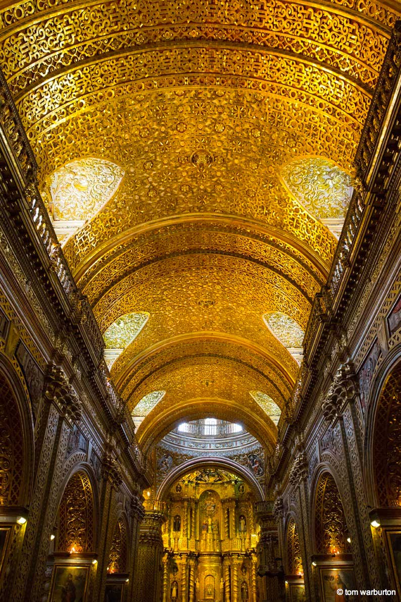 Gold leaf and elaborate architecture in one of the Baroque churches in Quito
