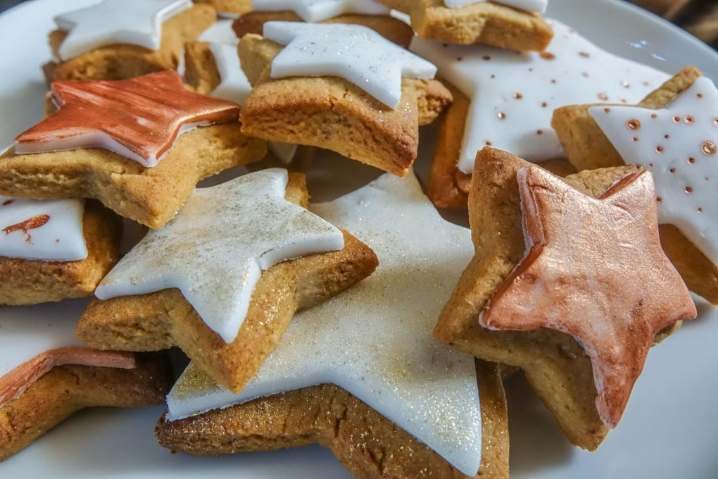 a plate of christmas biscuits