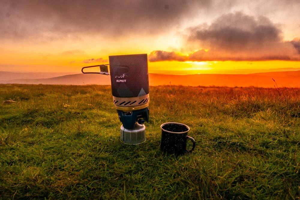 sunset and camping stove