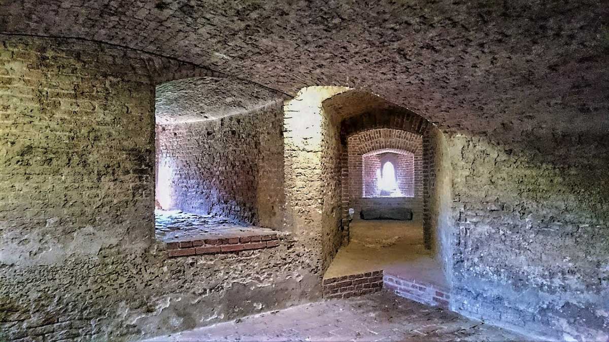 inside tattershall castle with stone walkways