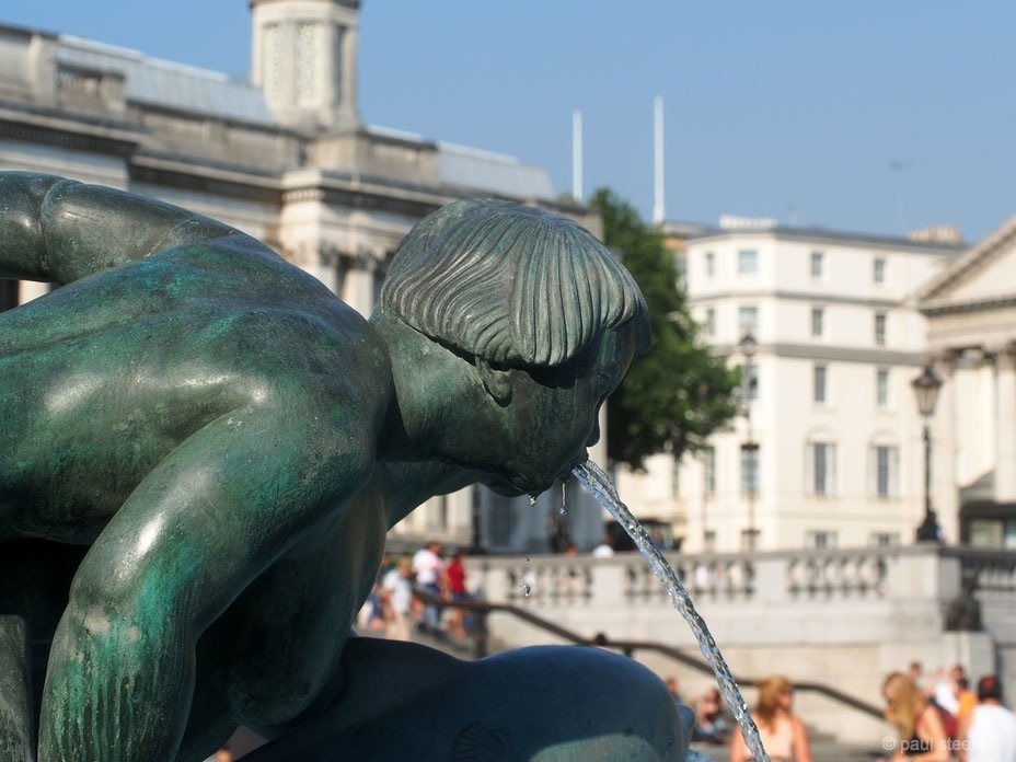 small statue in Trafalgar Square